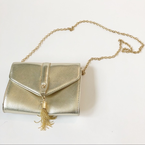 Guess Handbags - Guess gold evening bag with chain strap